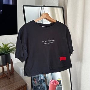 No human is illegal CHNGE Cropped tee